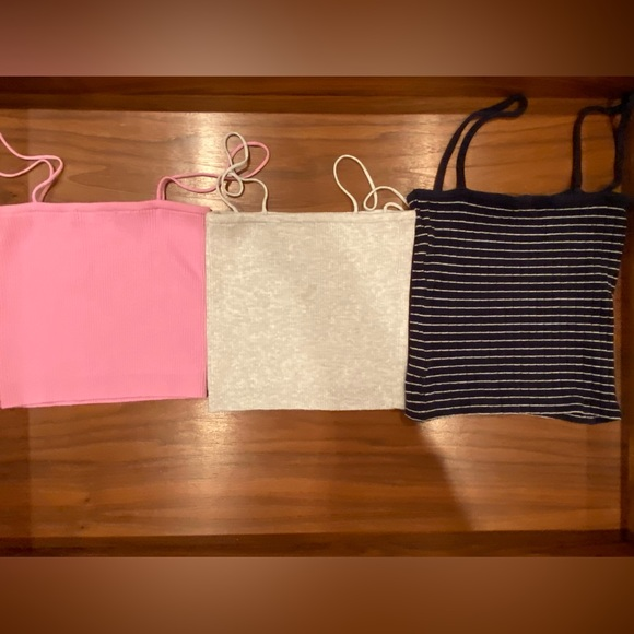 Brandy Melville Tops - Brandy Melville,‎ 3 crop top tanks. pink, Grey, Blue + White. All One size